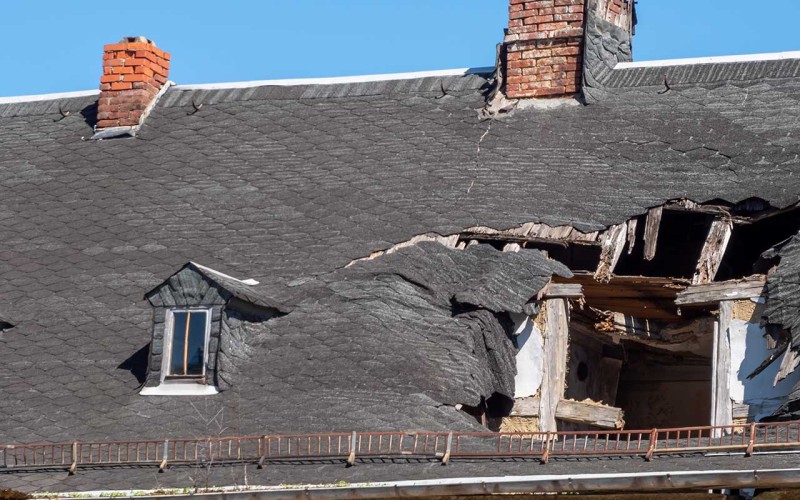 Roofers replacing roofing in Stroudsburg, PA.